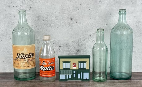 Collection Of Moxie Soda Bottles