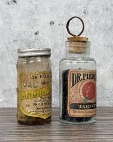 Pair Of Early Snake Oil Cure Bottles