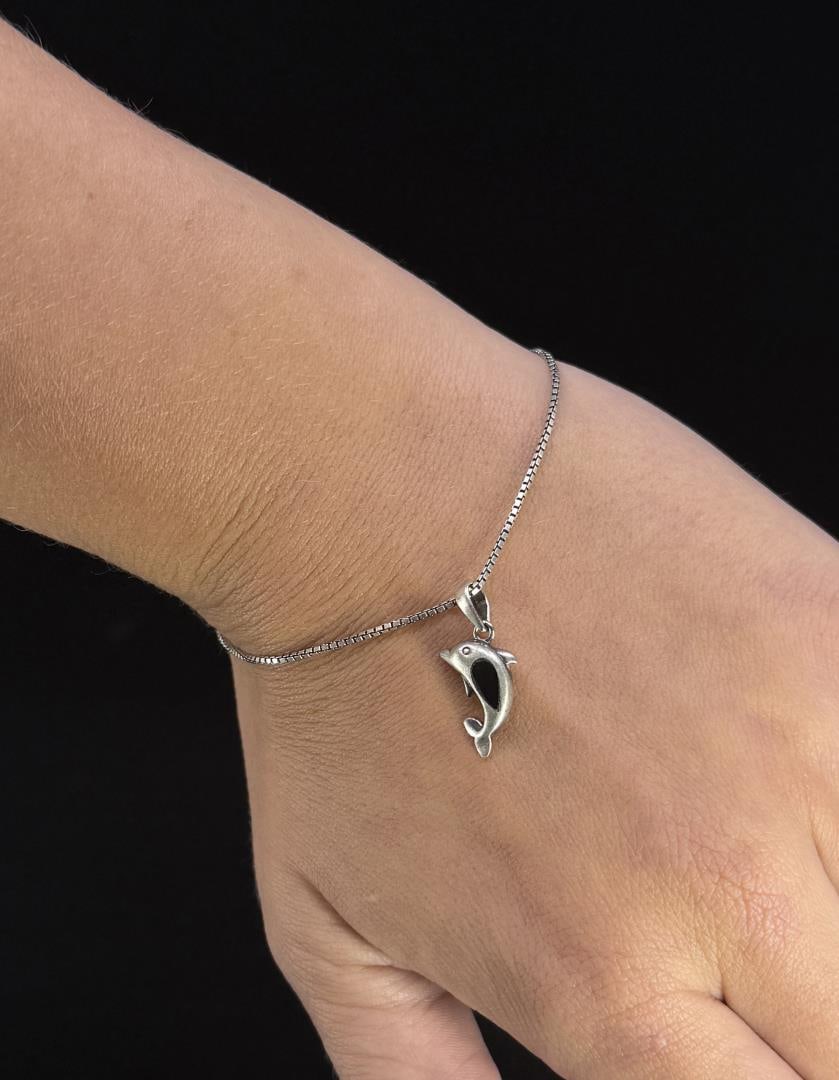 Sterling Silver Dolphin Bracelet: 8 3/4" long open.