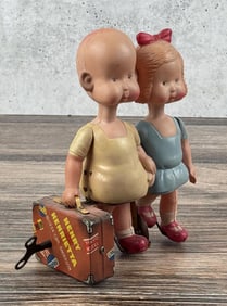 Henry & Henrietta Travelers Celluloid Wind Up Toy