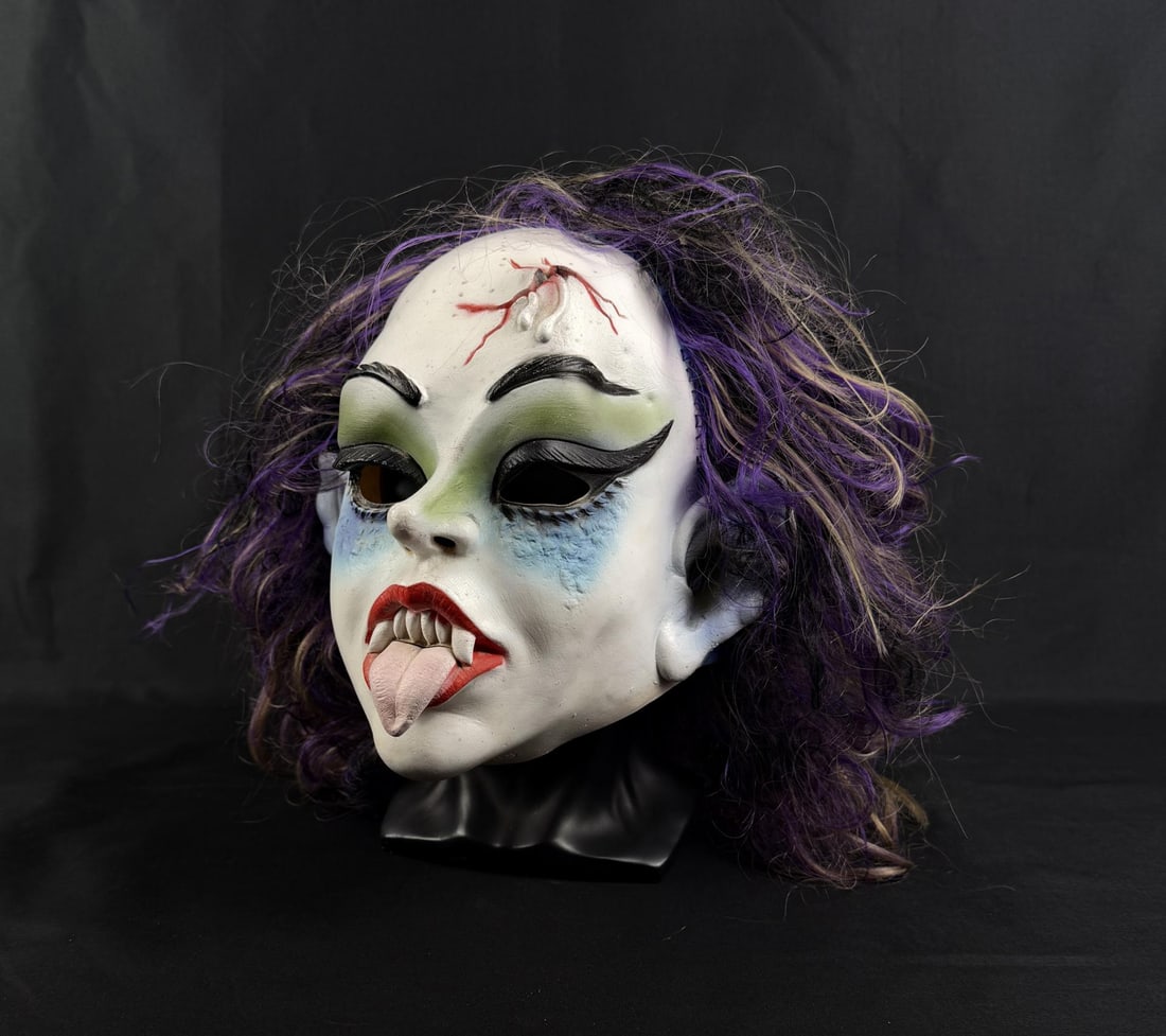 1988 Cesar Vampire Halloween Mask: Mask is sticky and has a tear near the ear.