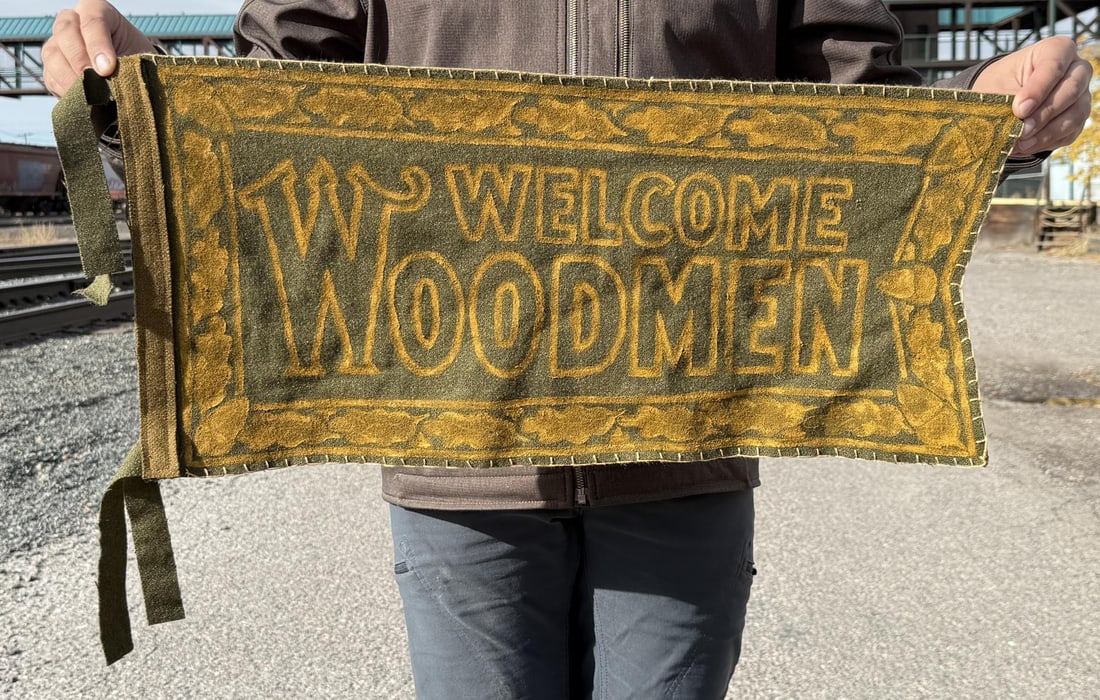 Welcome Woodmen MWA Felt Pennant Banner: Modern Woodmen of America. Measures 25" by 12".