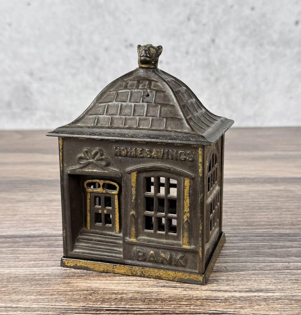 1891 Cast Iron Home Savings Bank JE Stevens: With the original bear head.