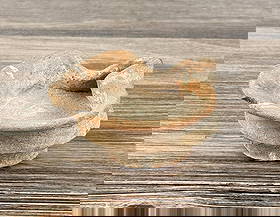 Ancient Roman Terracotta Oil Lamp: 4 1/4" diameter, 2 1/4" tall.