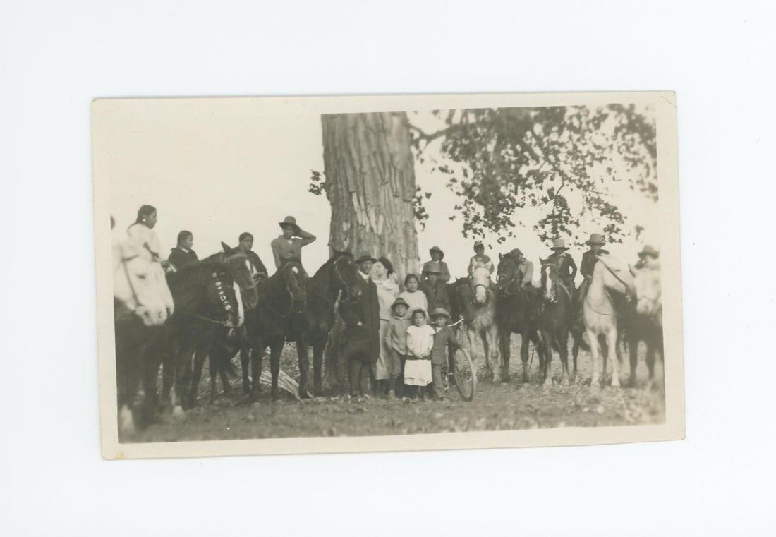 Crow Indians on Horseback Montana Photo: 3 3/8" by 5 1/2". Provenance: Aline Natalie Burgess Claremont Los Angeles, daughter of James Gregor Burgess builder of the Burgess Baptist Church Crow Agency Montana, through Decent.
