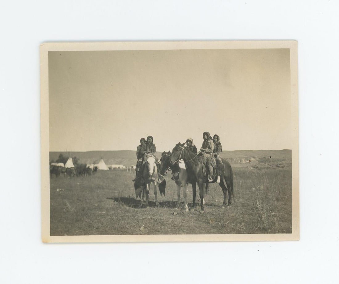 Parade Leader at Crow Indian Fair Montana Photo: Title on Back: Parade Leader at Crow Fair. 3 1/4" by 4 1/4". Provenance: Aline Natalie Burgess Claremont Los Angeles, daughter of James Gregor Burgess builder of the Burgess Baptist Church Crow Agency