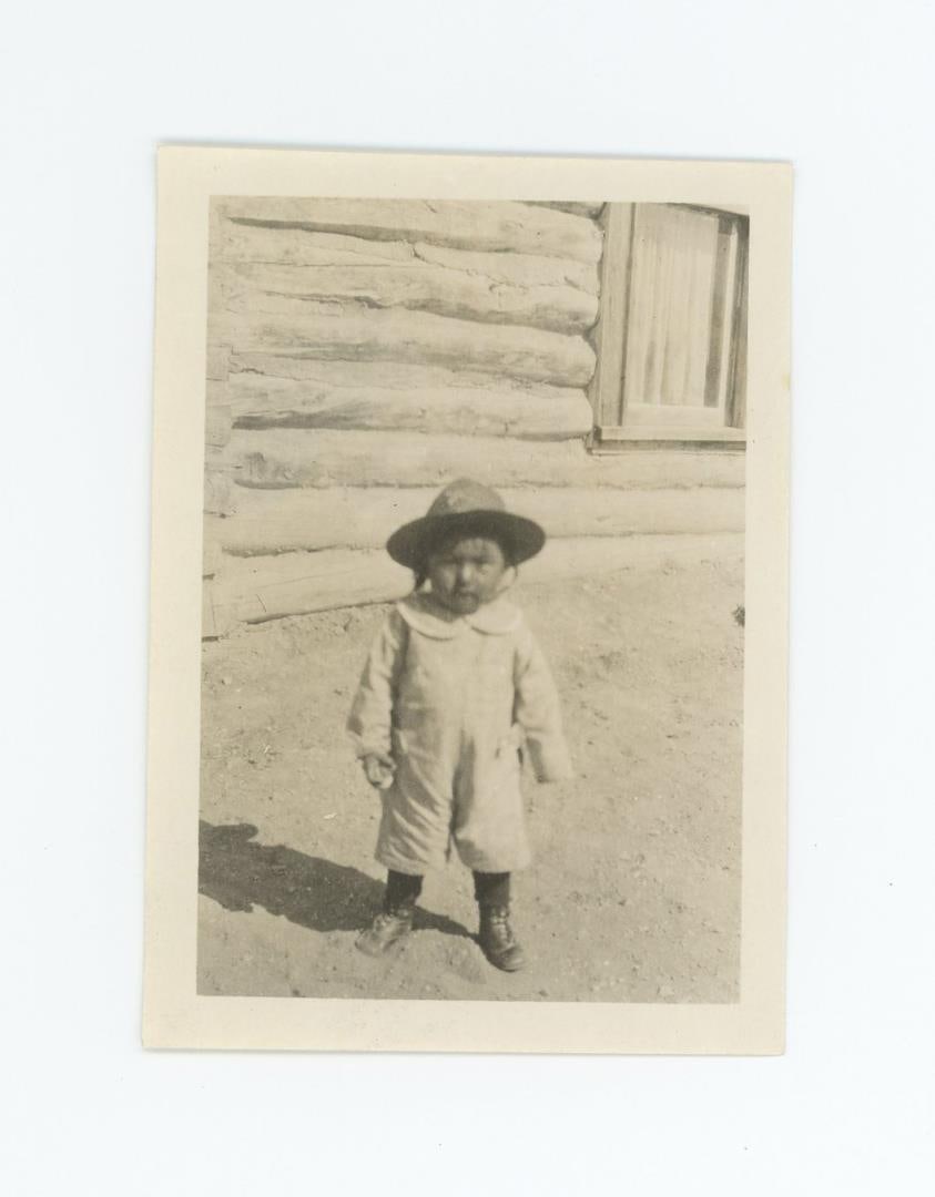Crow Indian Child Reno School Montana Photo: 2 1/2" by 3 1/4" Provenance: Aline Natalie Burgess Claremont Los Angeles, daughter of James Gregor Burgess builder of the Burgess Baptist Church Crow Agency Montana, through Decent.