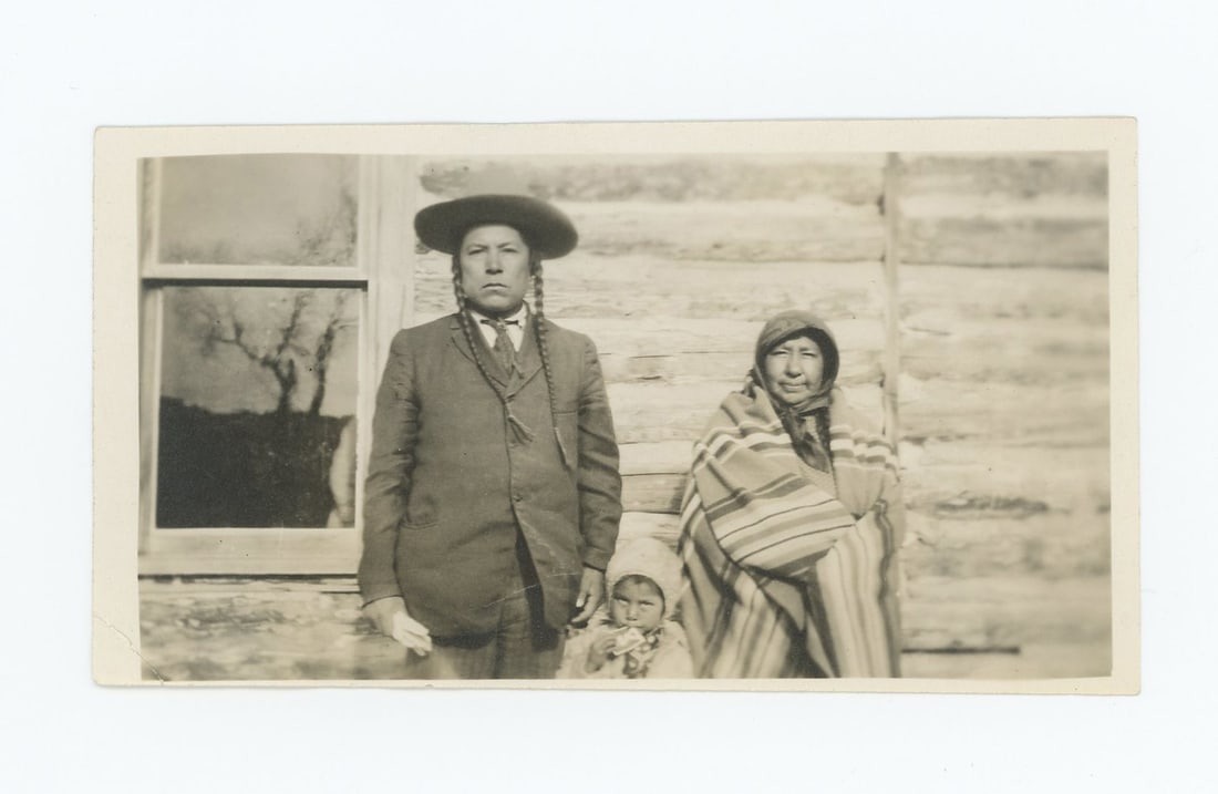 Lucy Old Horn Family Crow Agency Montana Photo: 2 1/2" by 4 1/2". Provenance: Aline Natalie Burgess Claremont Los Angeles, daughter of James Gregor Burgess builder of the Burgess Baptist Church Crow Agency Montana, through Decent.