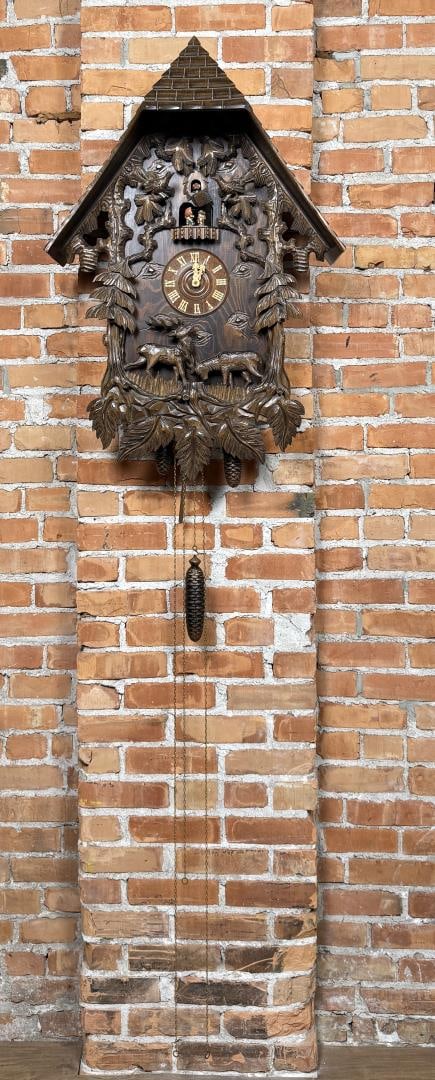 Exceptional Cuendet Black Forest Cuckoo Clock: 25" by 39" without weights or chains. In working condition.