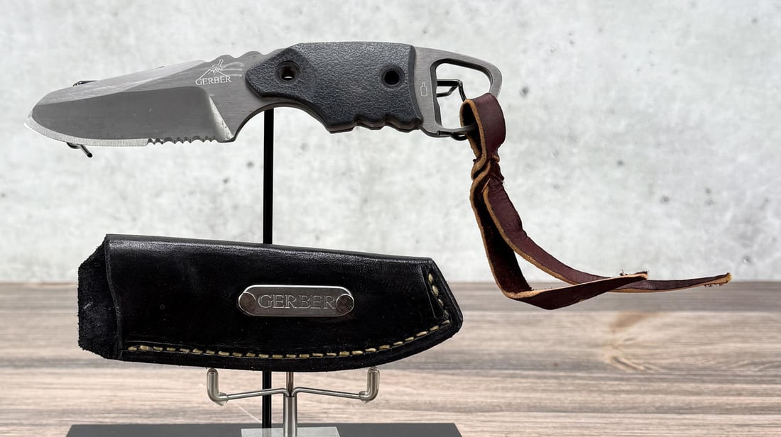 Gerber Epic Knife: The black leather sheath is made by EF Ericksen of Ennis, Montana. Knife measures 7 1/8" long.