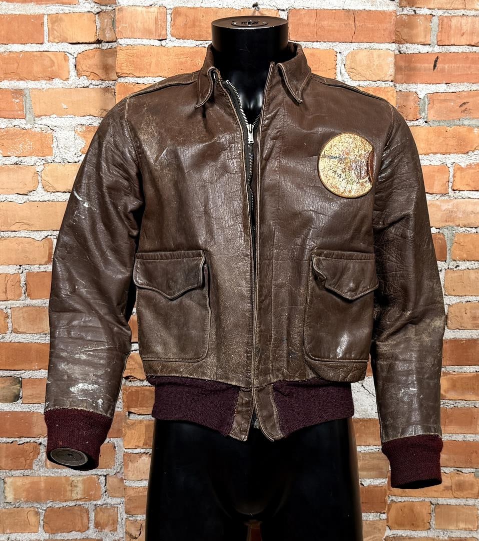 WW2 A2 USAAF Army Air Corps Pilot Flight Jacket: Yuma Army Air Field patch. 22" across the chest by 20" long by 17" shoulder to shoulder. Jacket marked D4226 under the collar. Affixed to the left breast is a painted patch for the Yuma Army Air Field