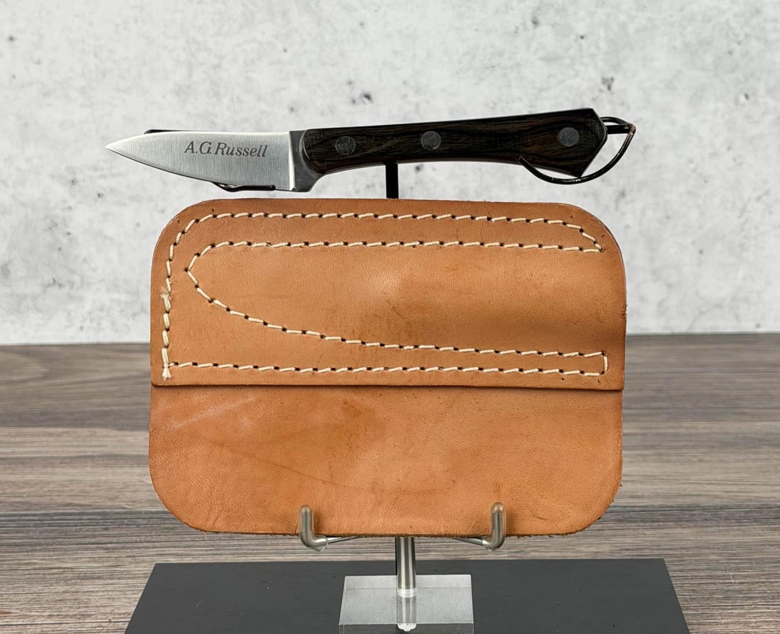 A.G. Russell Woodswalker Knife: Made in Japan. 5 7/8" long. Never used or carried.