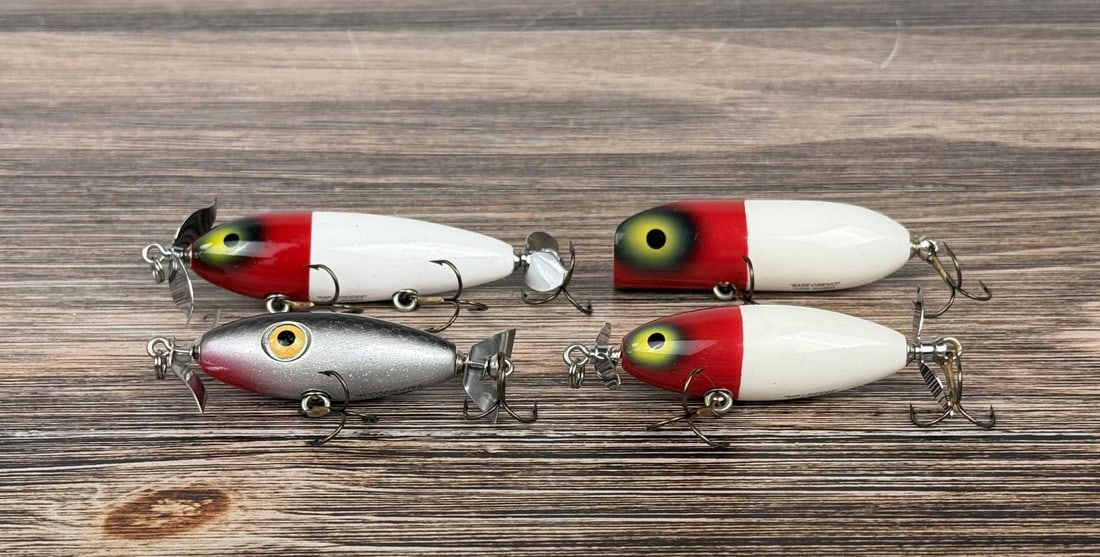 Collection of Luhr Jensen Fishing Lures: Lot includes 2 Nip-I-Diddee, a Bass Oreno and a Woodchopper.