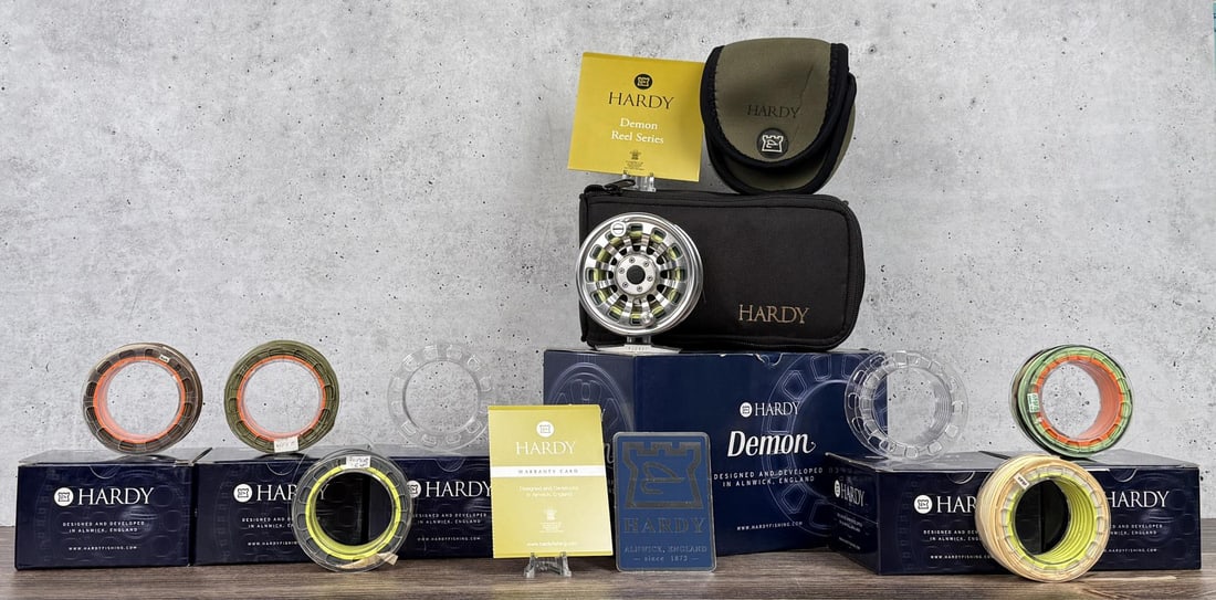 Hardy Demon 3000 Fly Fishing Reel and Extra Spools: Sold with original boxes, warranty card, and extra spools loaded with varying weight lines.