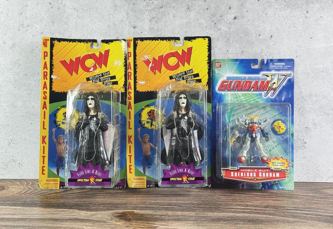 Gundam and WCW Toys: New on card.