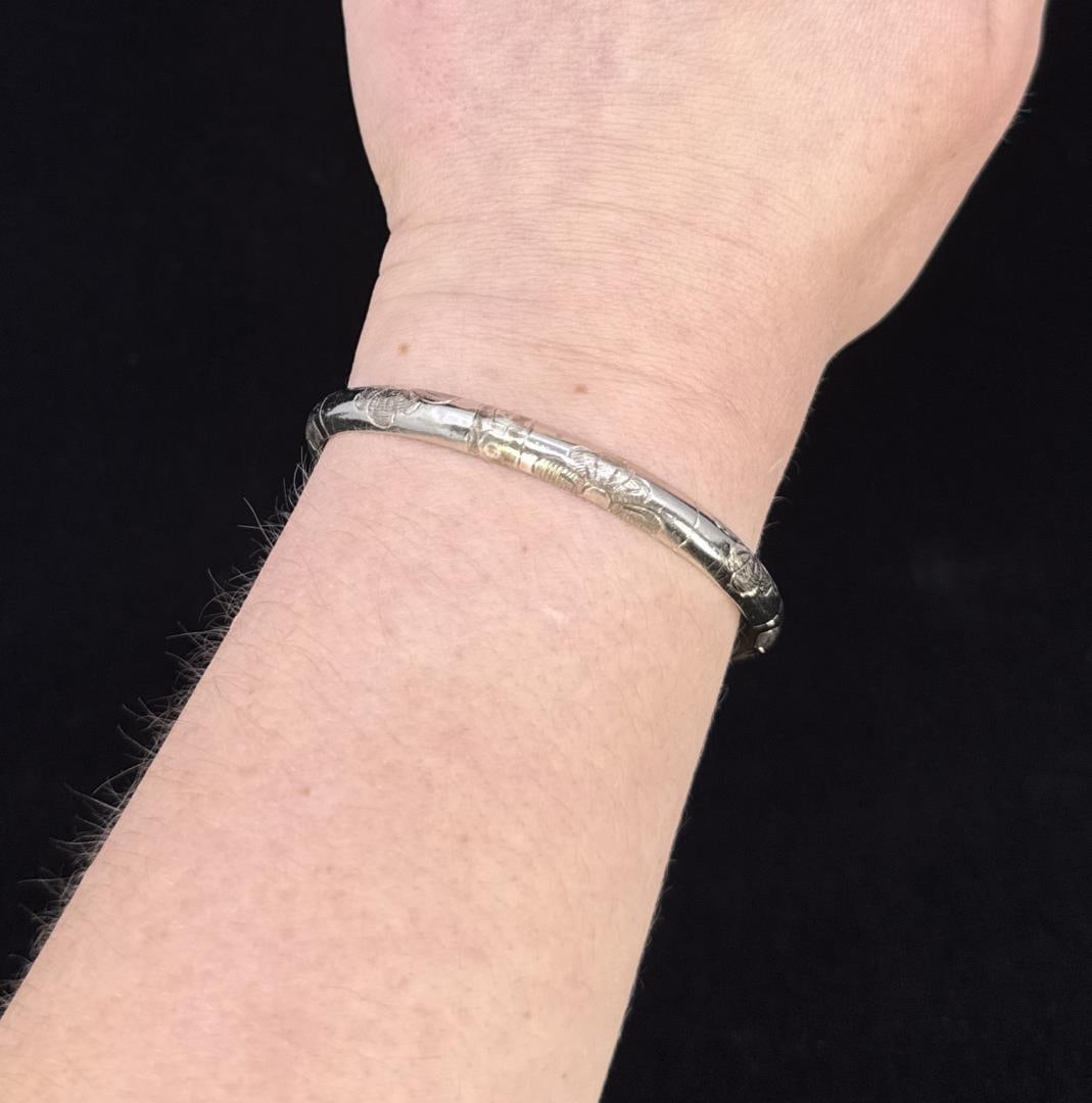Thai Sterling Silver Bangle Bracelet: 2 5/8" outside diameter.