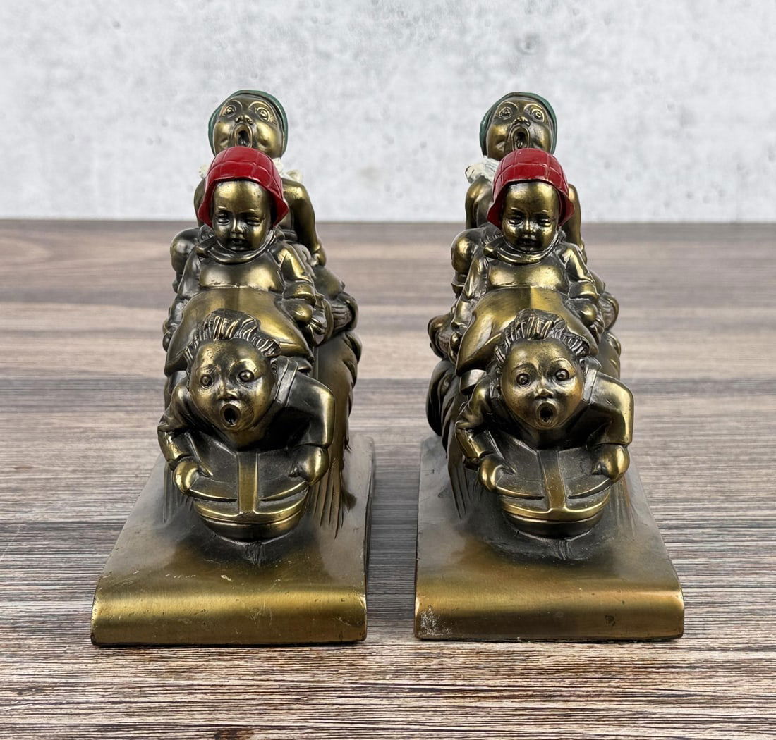 Kronheim & Oldenbusch K&O Sledding Bookends: 5 5/8" by 5" by 2 3/4"
