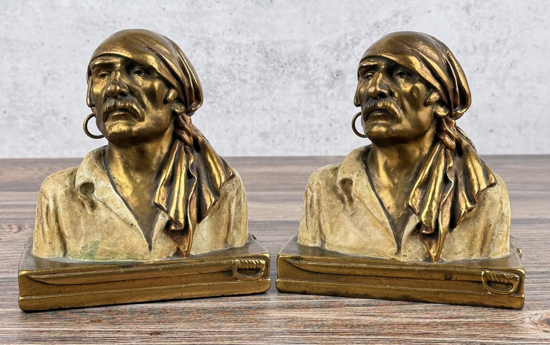 Paul Herzel Marion Bronze Pirate Bookends: 6 3/4" by 6 3/8" by 3 1/2".