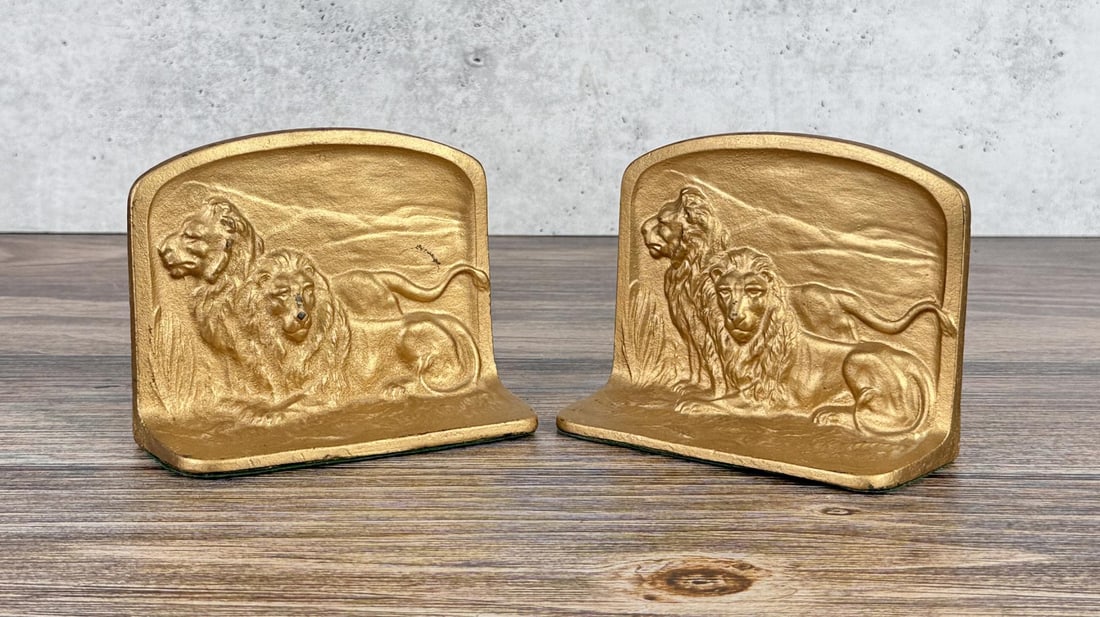 Lions on Savannah Cast Iron Bookends: Mold mark 21 on the reverse of each. 5 1/4" by 4" by 2 1/4".