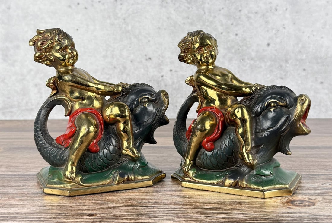 Cupid Riding a Dolphin Bookends: 6 5/8" by 6 1/8" by 3 3/8"
