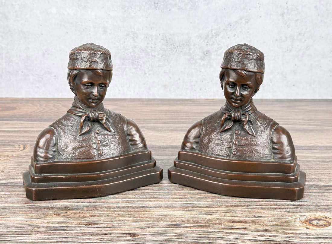 Armor Bronze Dutch Boy Bookends: 7" by 6 3/4" by 3 1/2". One has a crack.