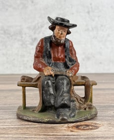 Wilton Cast Iron Amish Man on Bench Doorstop