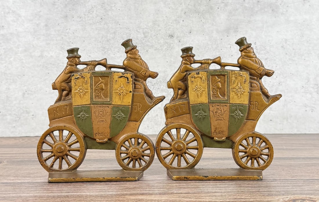 Nuydea Cast Iron Stagecoach Bookends: 7" by 6 1/2" by 1 1/2".