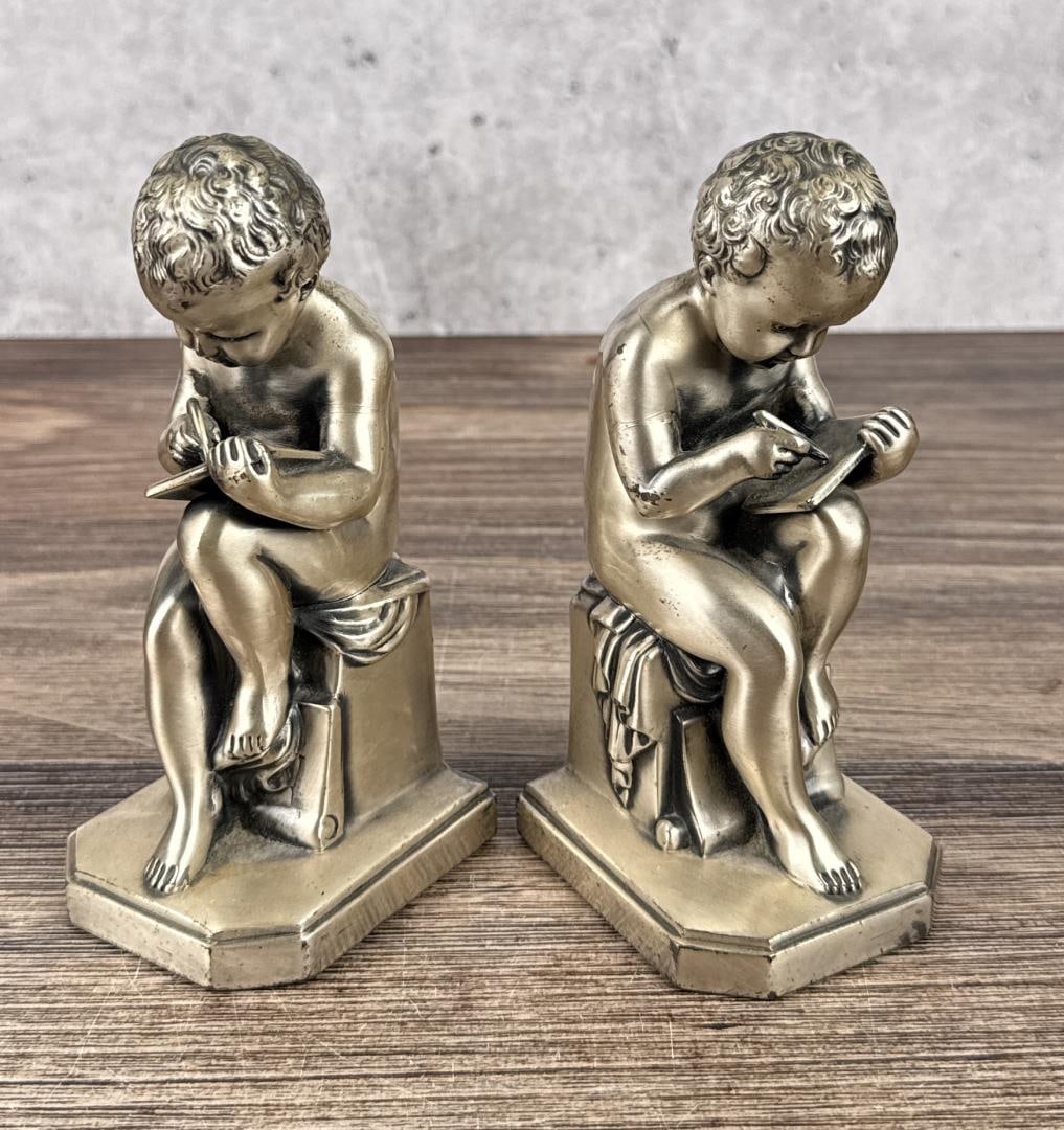 Jennings Brothers Learning to Write Bookends: 6 3/8" by 3 1/8" by 2 3/4".