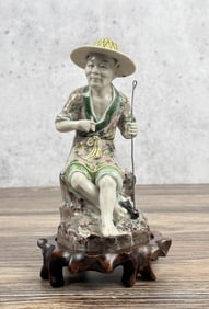 Chinese Porcelain Fisherman Figurine Mudman