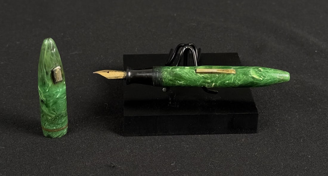 Antique Green Marbled Fountain Pen: 14K gold nib. 4 1/8" long. Missing clip as shown.