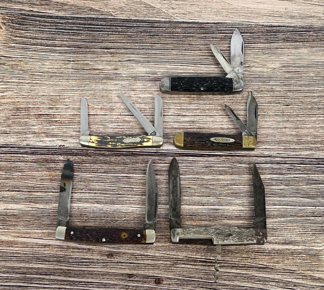 Collection of Pocket Knives: Boker, Pocket Eze, Schrade, and more.
