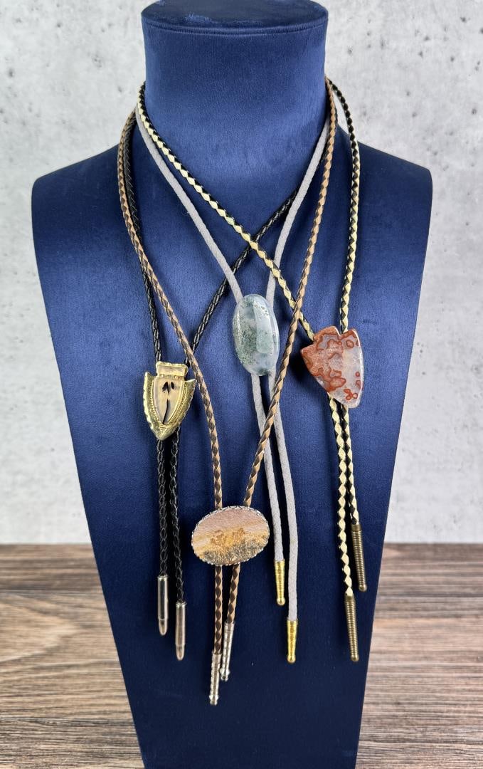 Collection of Cowboy Bolo Ties: Nice Grouping.