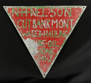 NH Nelson Cut Bank Montana Water Hauling Sign