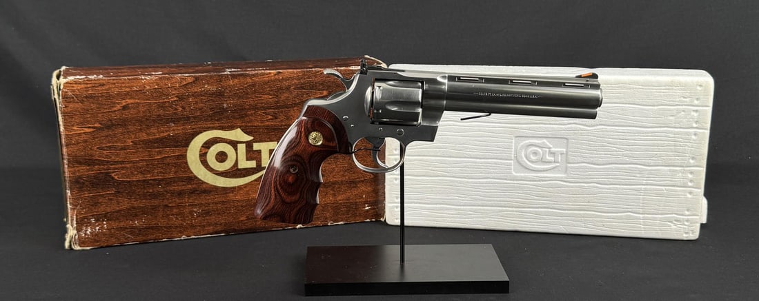 1993 Colt Python Matte Stainless .357 Revolver: 6" vent ribbed with blued, pinned, ramped serrated blade front sight having orange insert plus full under lug. Frame mounted blued Colt Accro rear sight with white outlined sight blade. Mfg. 1993 (195