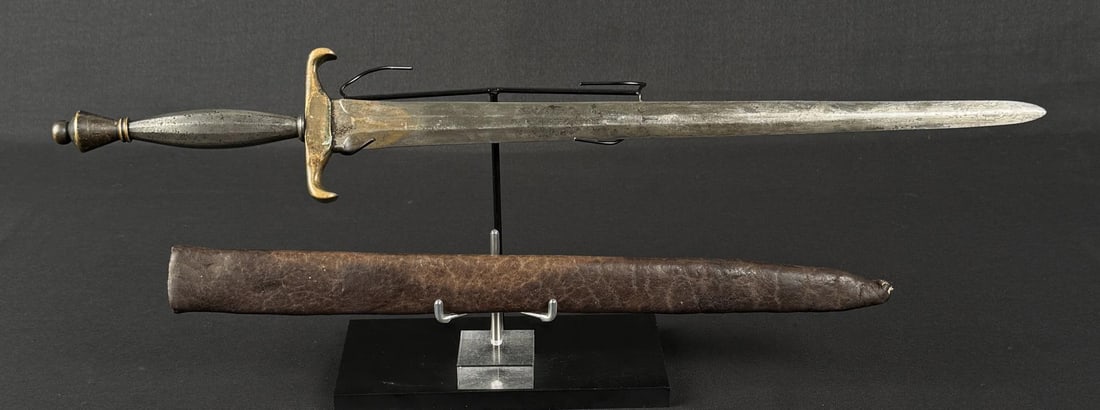17th Century Brass and Iron Dirk: 19 1/2" long. Provenance: Estate Collection of Nicholas Apergis.