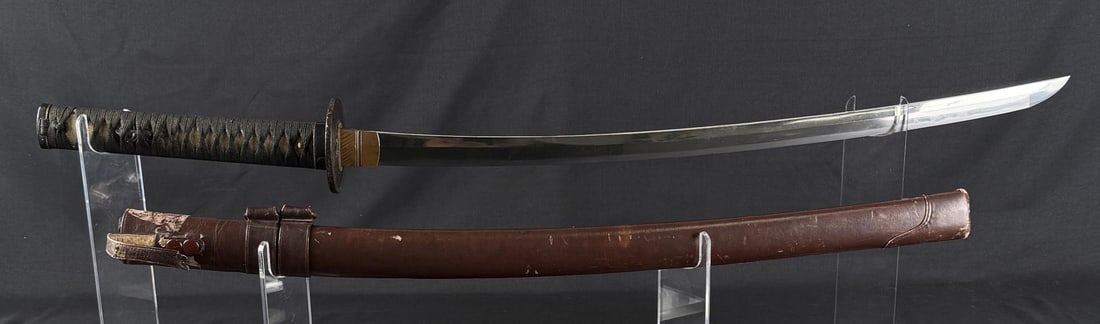 Iga-no-Kami Kanemichi Japanese Samurai Sword: 33 1/2" long. Inscription on one side reads Iga-no-Kami Kanemichi. 16th-17th Century Japan. Gorgeous sword in old fittings.