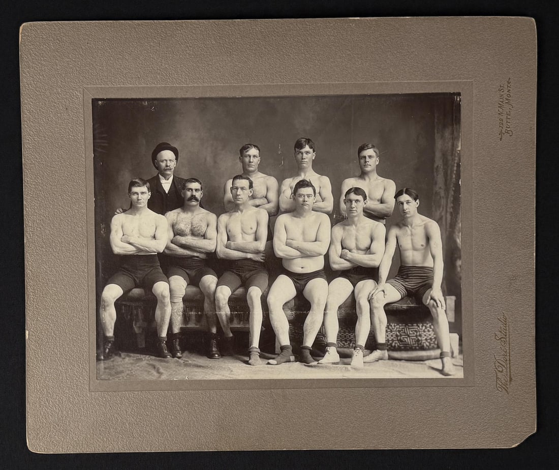 Butte Montana Pugilist Boxers Cabinet Photograph: Embossed studio stamp reads The Dore Studio. 10 1/4" by 12 1/4". From the Ralph Merry Collection of Historic Photography.