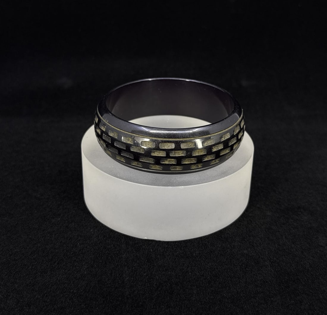 Carved Bakelite Bangle Bracelet: 3" diameter.
