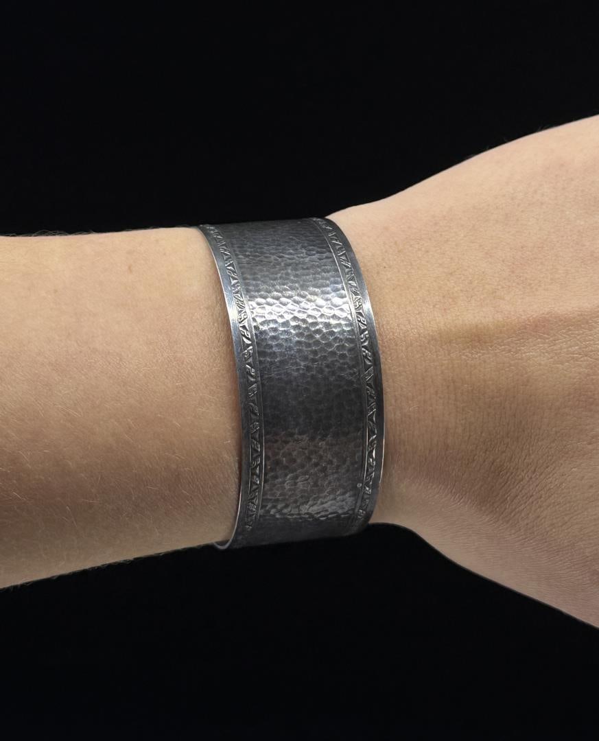 Sterling Silver Hand Hammered Bracelet Cuff: Weighs 24.3 grams. Measures 2 3/8" by 2 1/4".