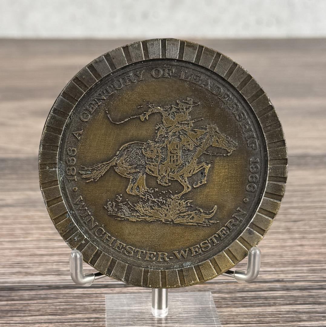 Winchester 100 Year Commemorative Coaster: A Century of Leadership 1866-1966. 3 1/4" diameter.