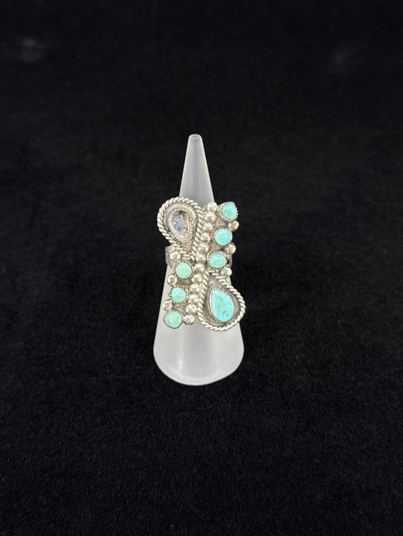 Old Pawn Navajo Sterling Turquoise Ring: Missing a stone. Size 6 1/2. 9.05 grams.