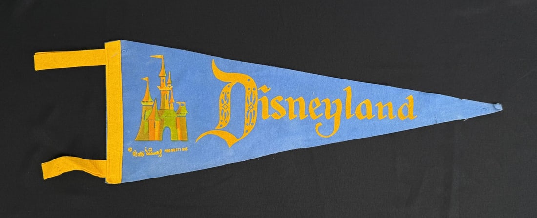 WDP Disneyland Souvenir Felt Pennant: 23" by 8 1/2". Walt Disney Productions.