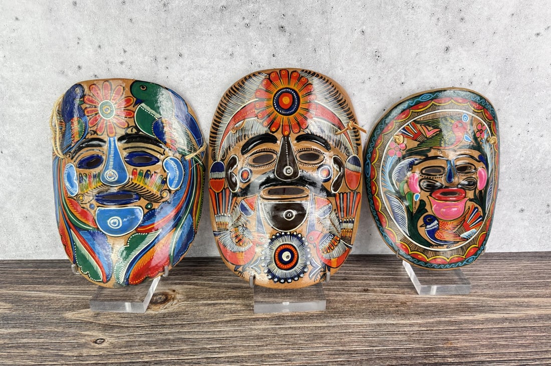 Mexican Folk Art Talavera Painted Masks: Largest is 9 1/2" by 7 1/4" by 2 3/4".