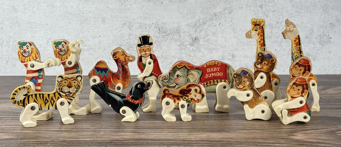 Fisher Price Junior Circus Toys Number 902: 14 Pieces total. Some of the pieces show considerable wear.