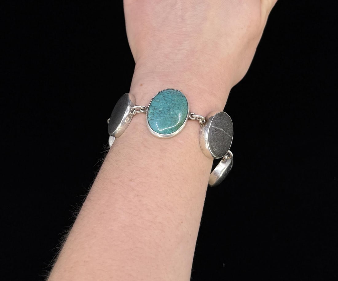 Terri Logan Sterling River Rock Stone Bracelet: 49.6 grams. 8 3/8" long when open, 1 1/8" wide.