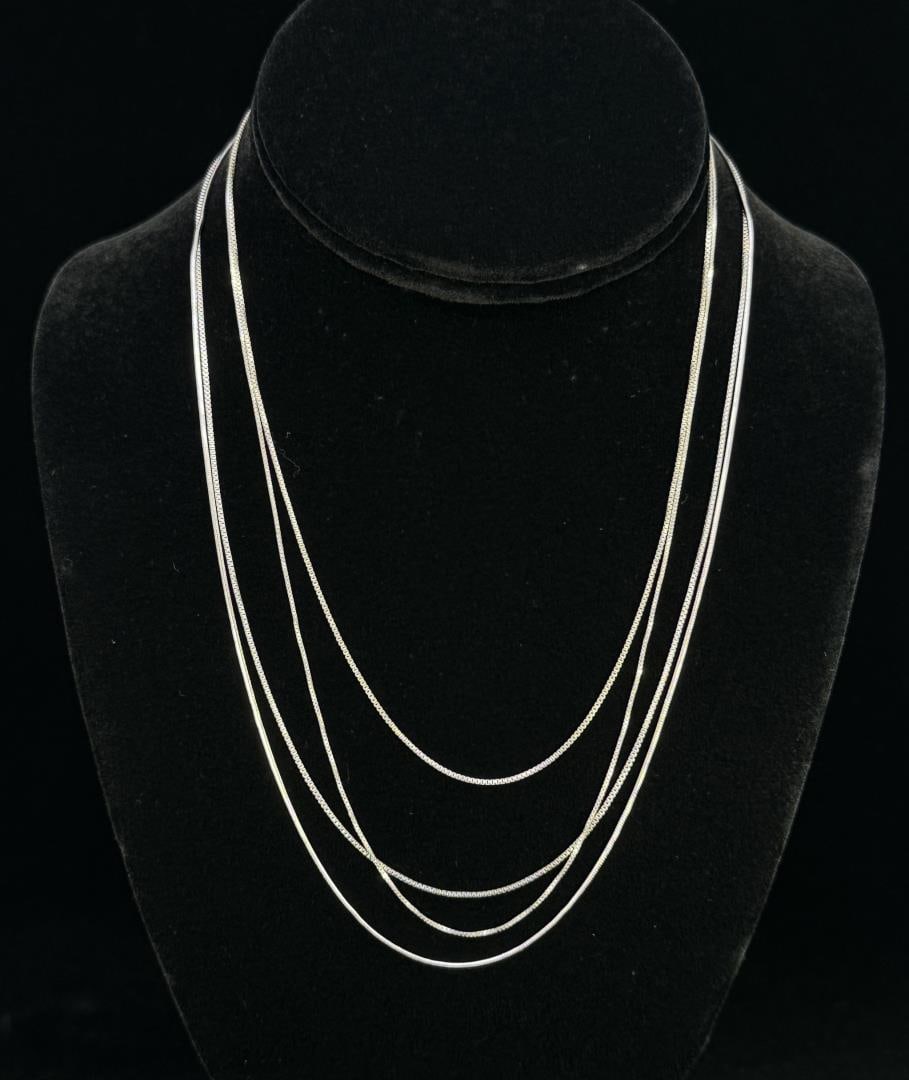 Sterling Silver Necklace Chains: Box and snake chains. 7.98 grams. 9" long.