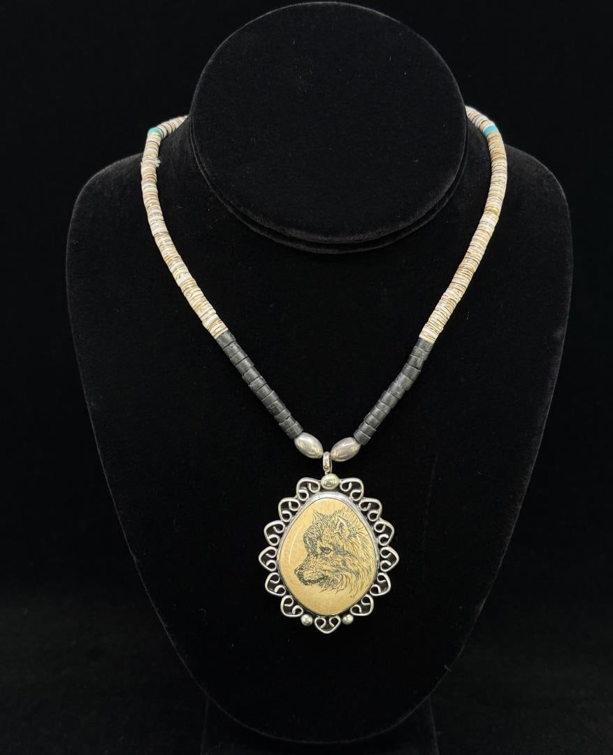 Navajo Sterling Silver Heishi Scrimshaw Necklace: 11 1/4" long closed. Pendant weighs 28.99 grams.