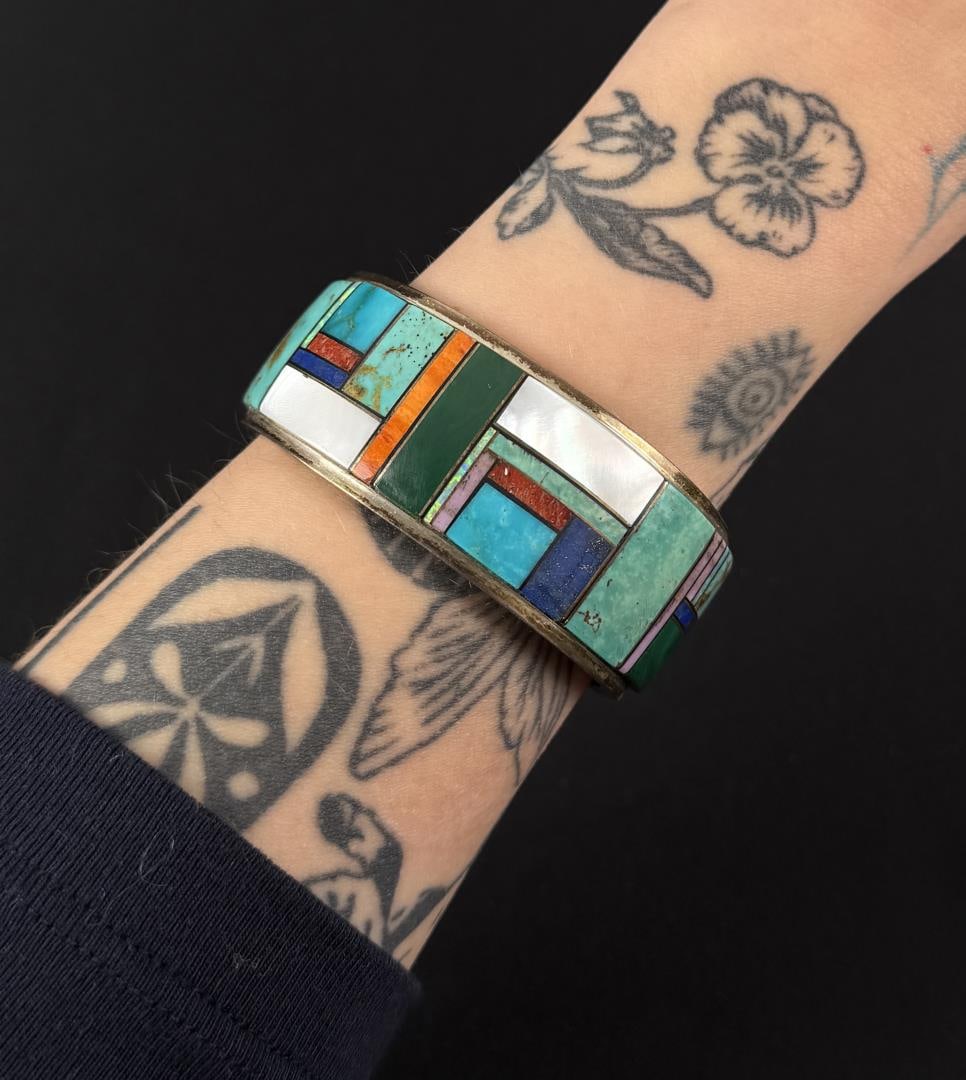 Zuni Sterling Silver Inlaid Bracelet: 61 grams. Missing inlay.