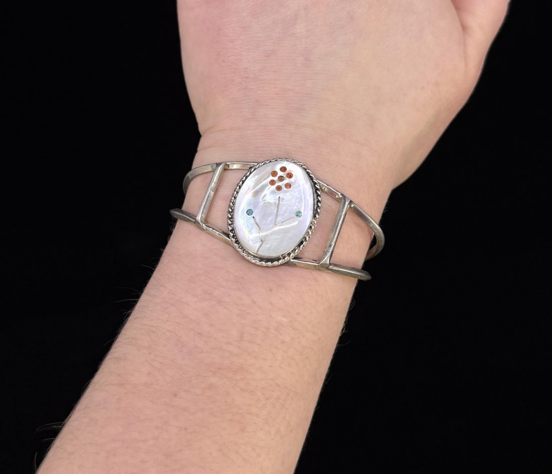 Zuni Sterling Mother of Pearl Cuff Bracelet: Flower Turquoise and coral. 2 1/2" outside diameter. 21.92 grams.