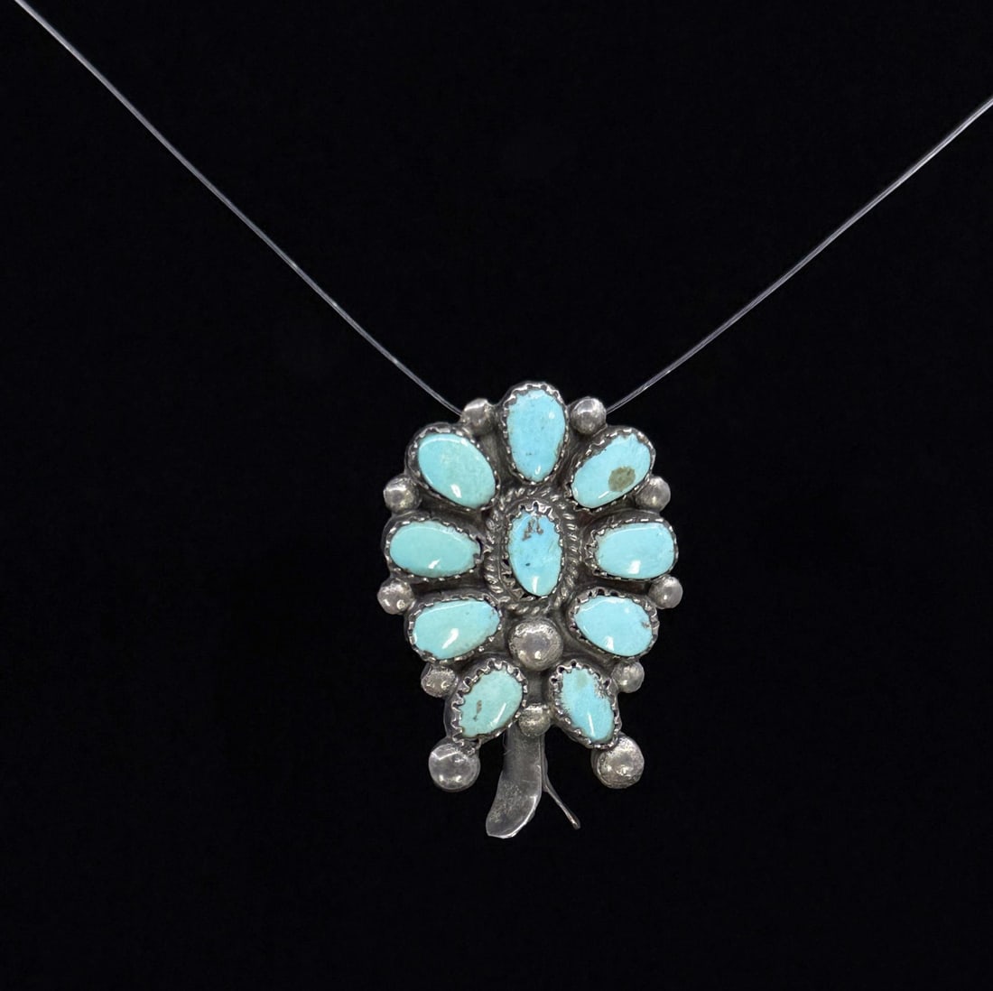 Zuni Petit Point Sterling Silver Turquoise Pendant: 1 1/2" long. 6.86 grams.
